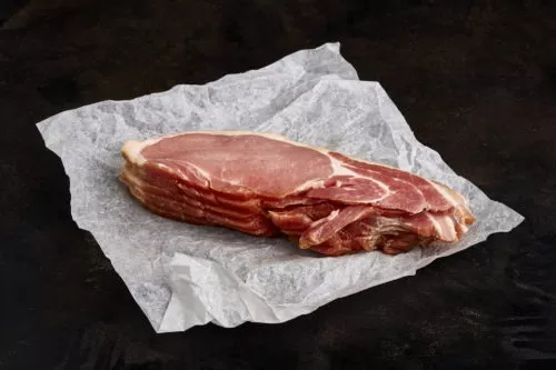 A stack of smoked streaky bacon